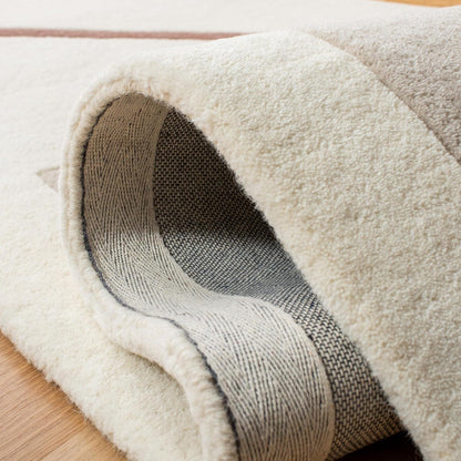 Snuvinae Hand Tufted Carpet & Rug