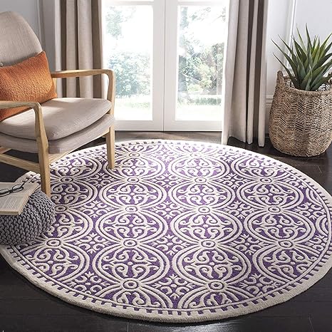 Snuvique Round Tufted Rug